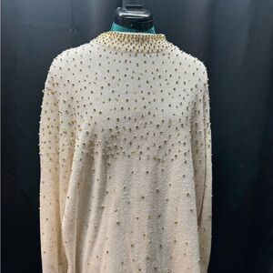 Elegant Cream Turtleneck Sweater with Gold Accents